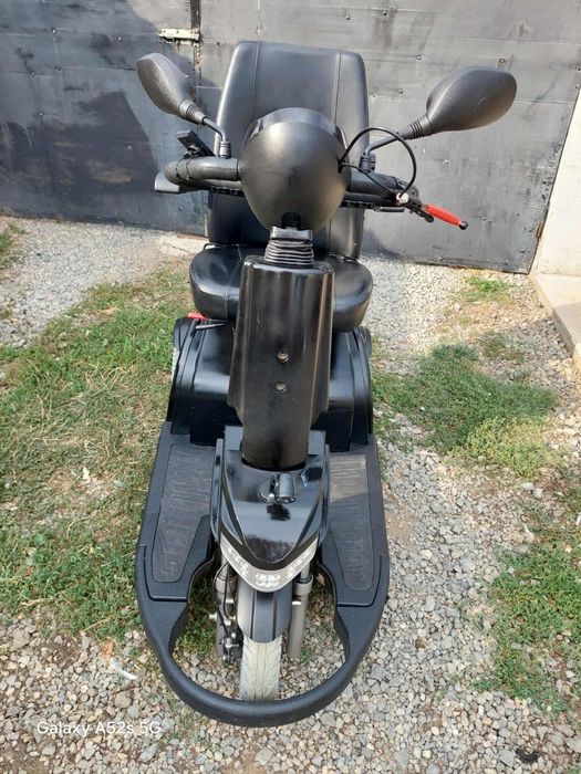 Scuter Carut electric pentru persoane cu dizabilităti handicap