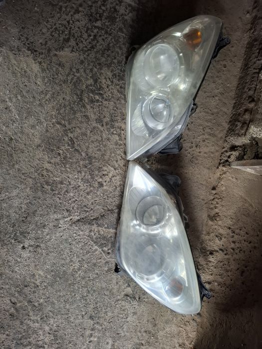 Faruri Opel Astra H în stare impecabila fără cleme rupte