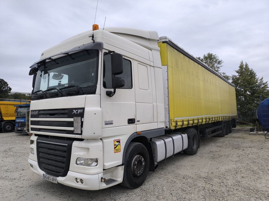 Ansamblu DAF XF 105 cutie automata an fabricație 2012 semiremorca Schm
