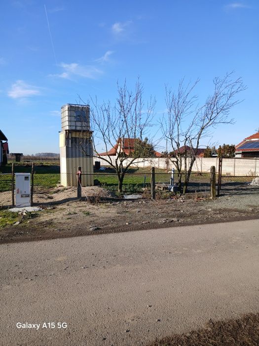 Teren intravilan 14 arii cu branșament apa si curent