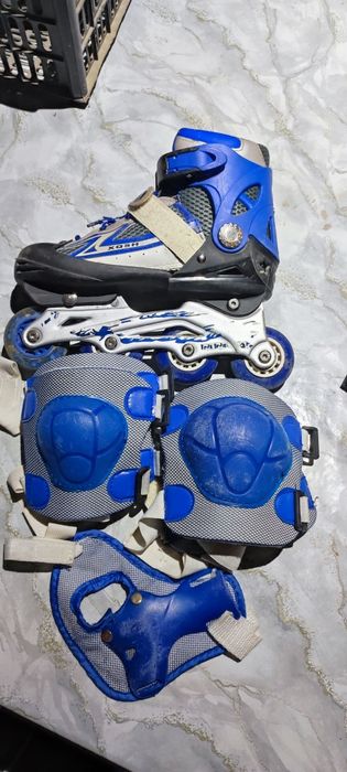 Роликовые коньки