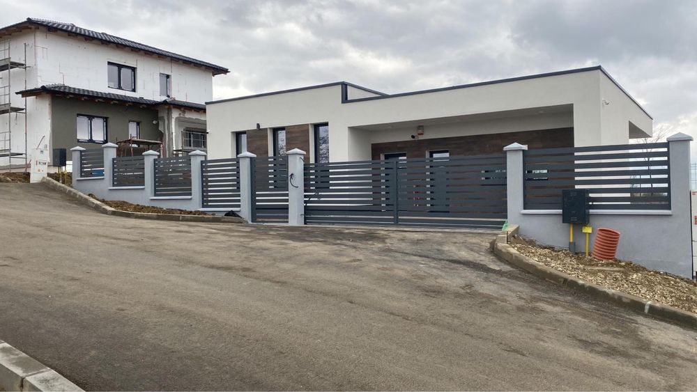 Porti si garduri auto moderne din profile de aluminiu sau oțel