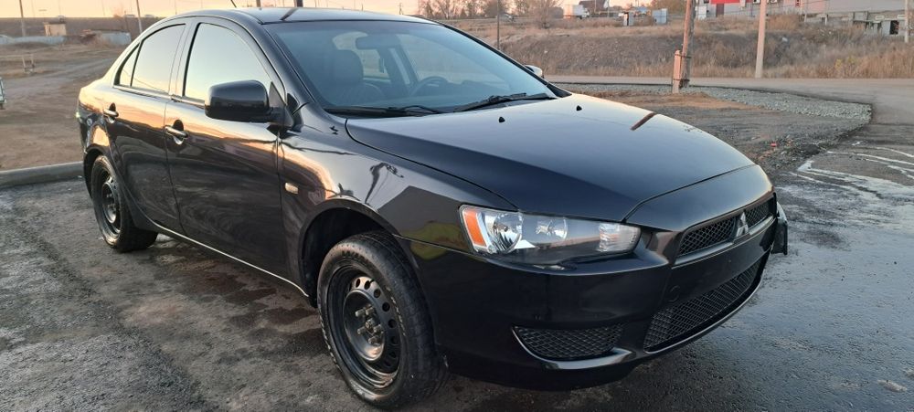 Лансер 10.2008 года автомат