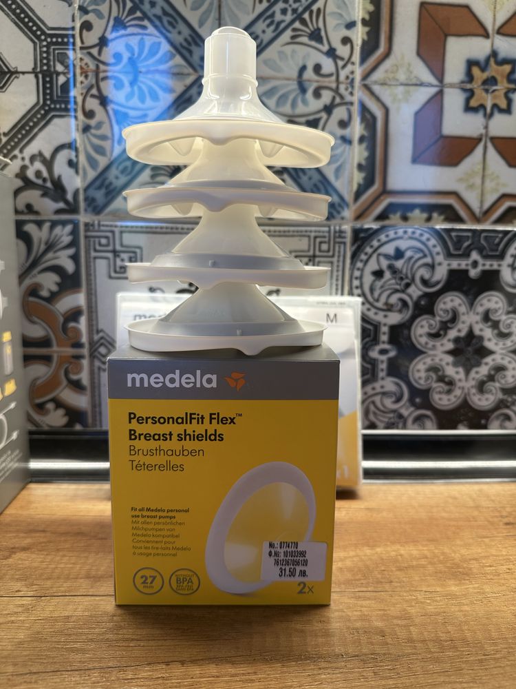 Medela swing maxi двойна електрическа двуфазна помпа за кърма + сутиен