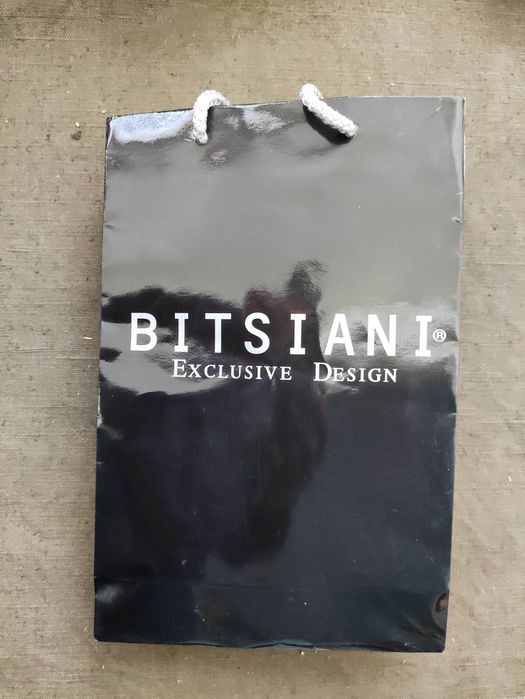 Продавам  елегантна шапка на Ирина Сардарева
и шал Cashmink Германия