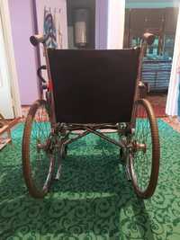Инвалидная коляска фирмы Ford для взрослого человека