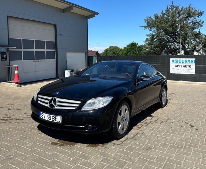 Mercedes-Benz CL500 automat schimb cu utilaje constructii