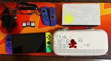 Nintendo Switch OLED + 9 игри + Аксесоари