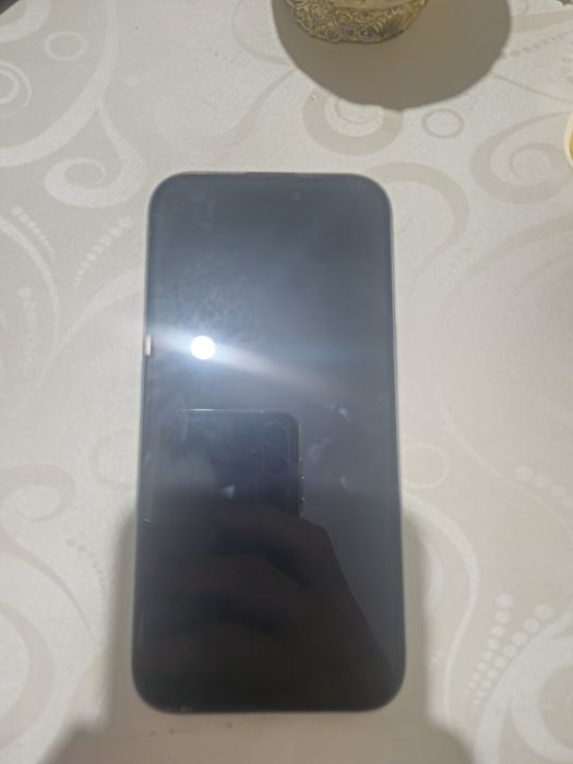 Айфон 15 в мятном цвете