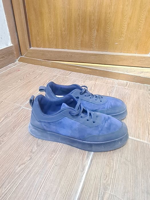 Santoni guanjo òrtacha sifat