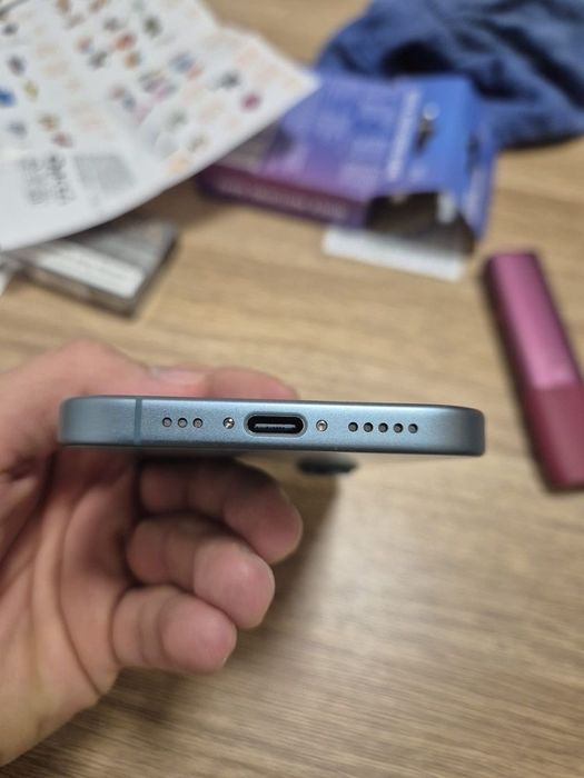 iPhone 16 Teal in garantie