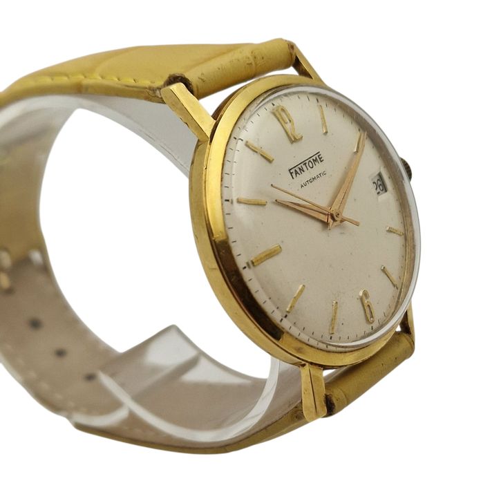 Ceas elvetian Fantome din aur 18k.