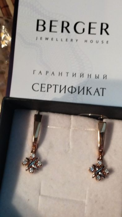 Продам золотые серьги