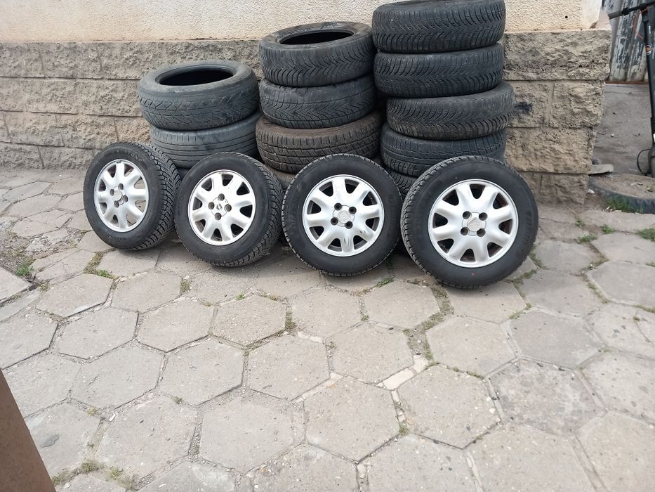 Алуминиеви джанти 14 ки и  гуми стават за сузуки балено и  голф 3