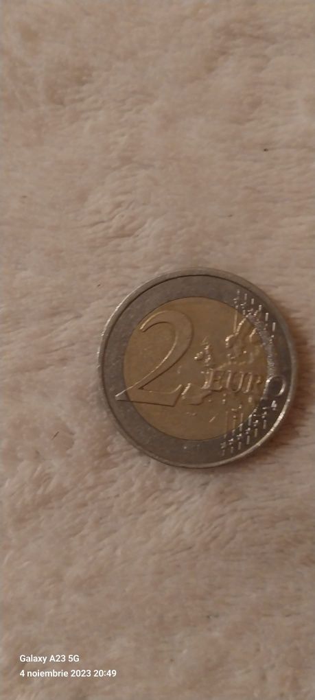 Moneda 2 euro cu defecte