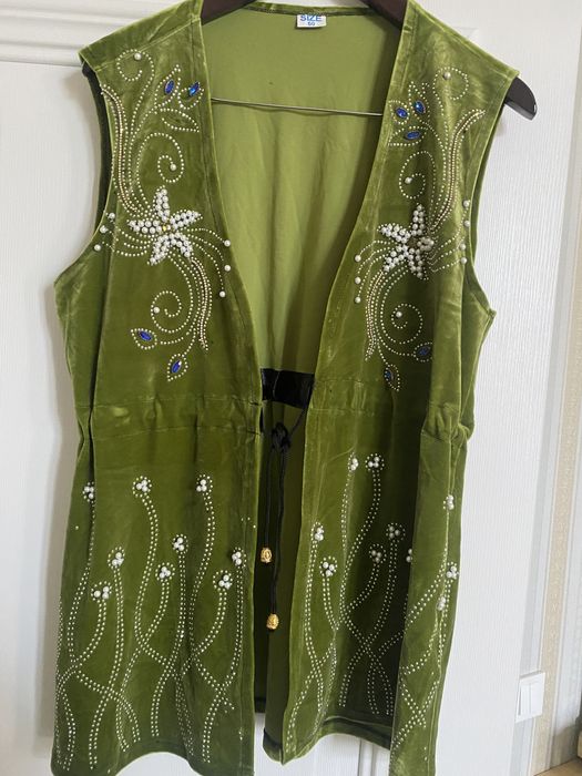 Продам кажекей новый цвет зеленый размер 48