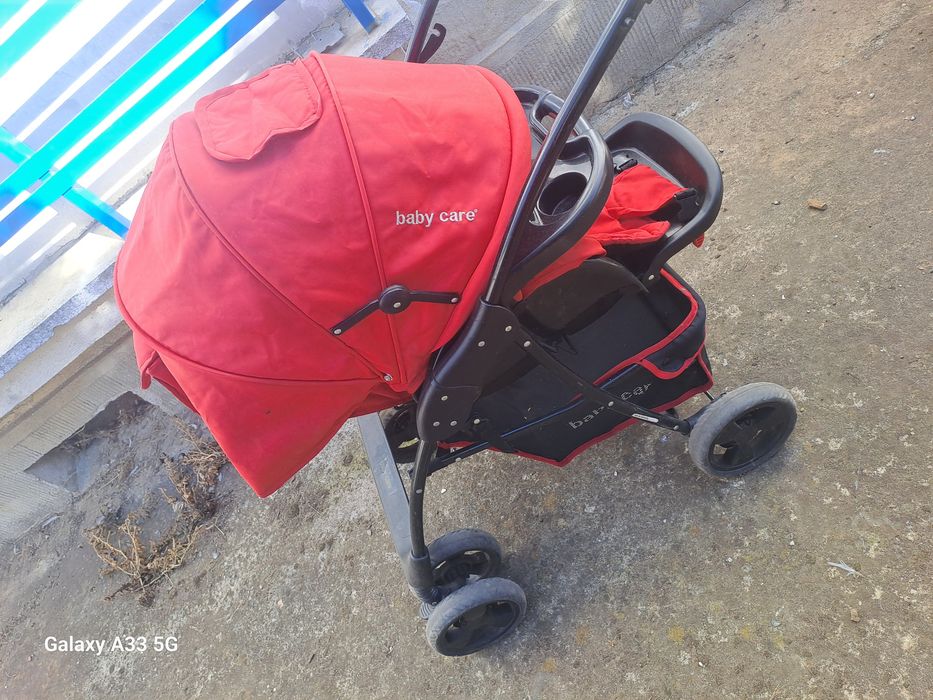 Vand Carucior bebe rosu