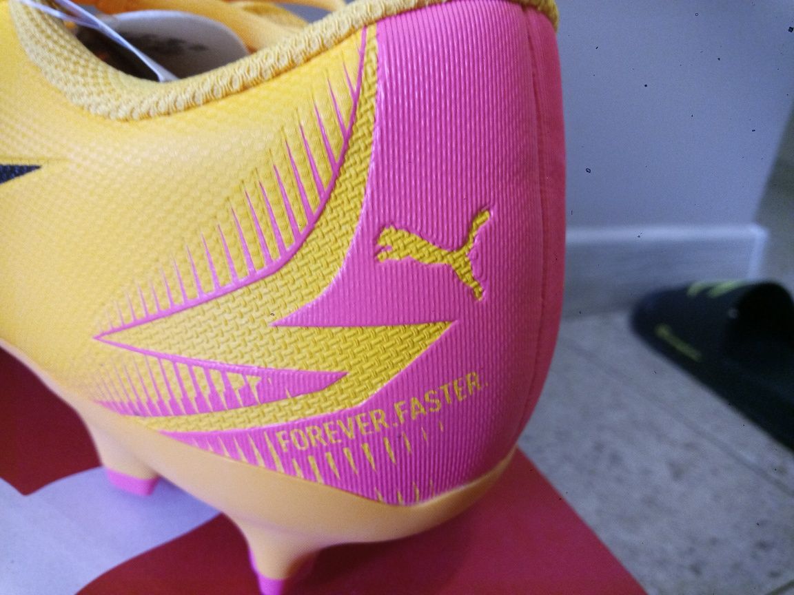 PUMA Ultra Play FG/AG Forever Faster - Sun Stream/PUMA Black/Sunset Gl