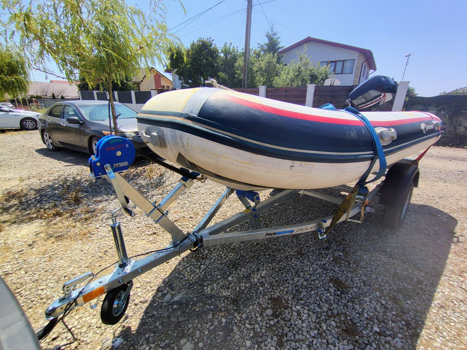 Ansamblu barca,motor și periodoc nou