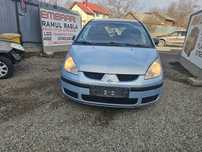 Dezmembrez Mitsubishi Colt 1.3 benzina cod 153.930 70KW an 2006