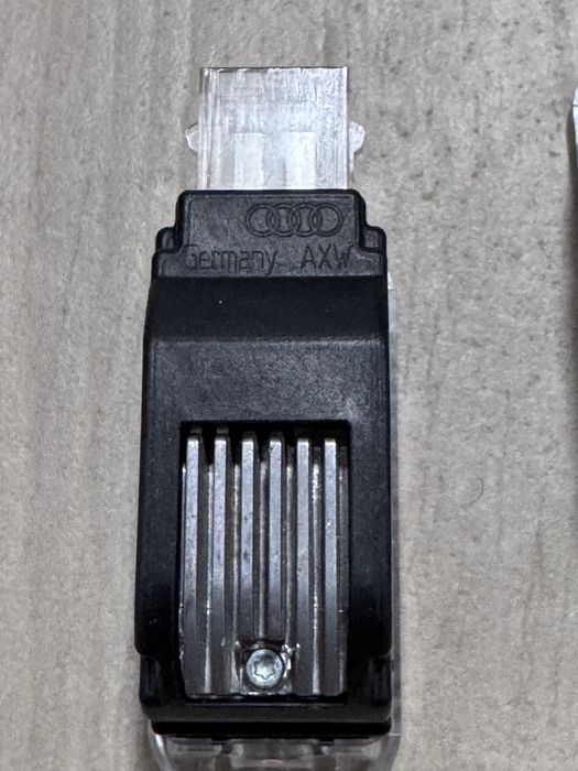 Audi Proiectoare LED Usa Logo Quattro Originale Set Stanga Dreapta