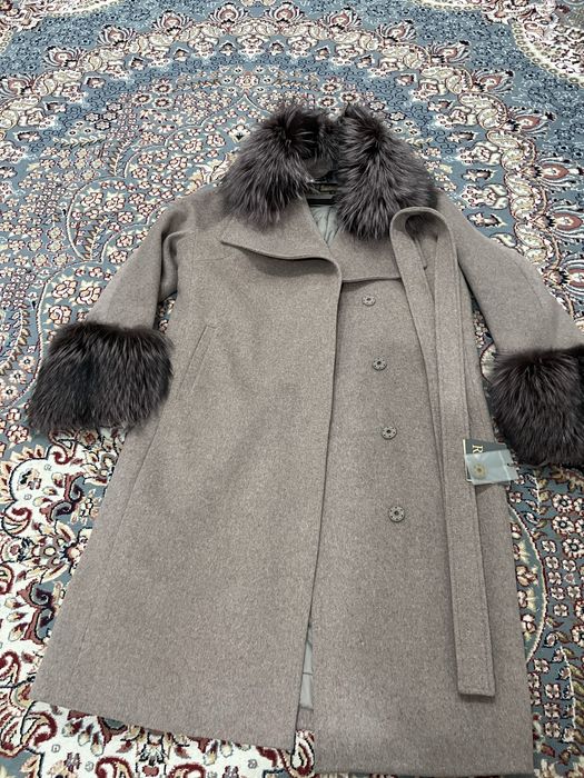 Продам пальто новое