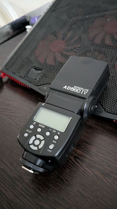 Фотовспышка andoer AD560 IV