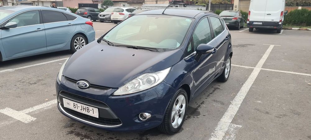 Ford Fiesta 1.6 hdi - 90cp -  schimb cu Touareg