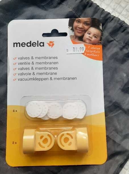 Ел. помпа за кърма Medela + торбички за кърма и резервни клапи