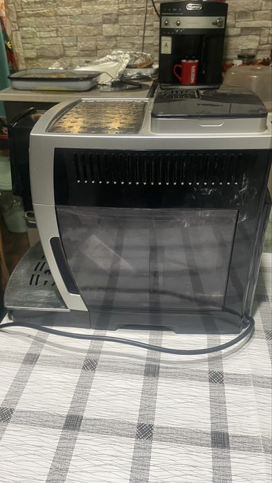 Каферобот Delonghi magnifica 23210w