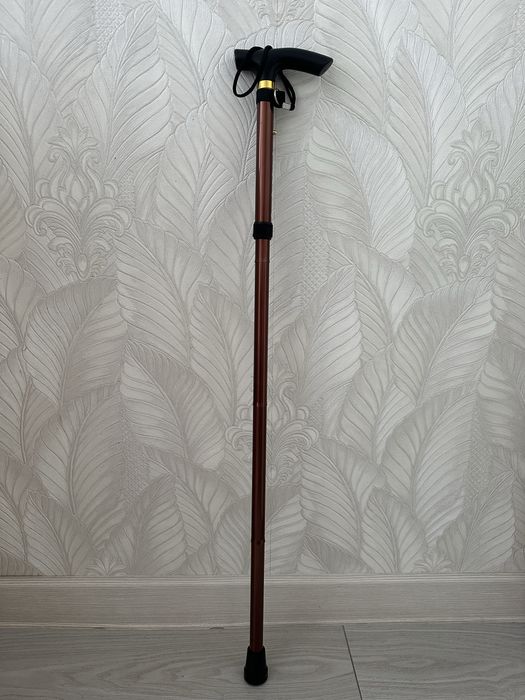 Трость , помогающая при хлдьбе