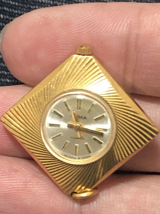 Позолоченные часы чайка