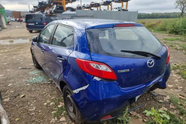 VOLAN broasca Macara geam stanga dreapta fata spate brat bascule etrier calaret fuzeta alternator electromotor bara fata capota far tripla stop stanga dreapta trager haion portbagaj  Mazda 2 DE motor 1.3 benzina  ZJ