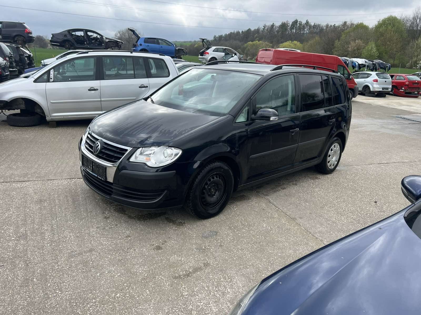 Vw Tuaran 1.9 105кс.код на мотора BLS 2009г.