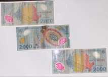 Bancnote cu eclipsa de 2000 lei si monezi