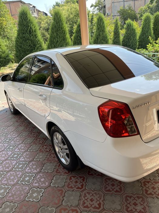 Lacetti 1.8 , 2011 2 позиция-механика, kraskasi tozza moshina,