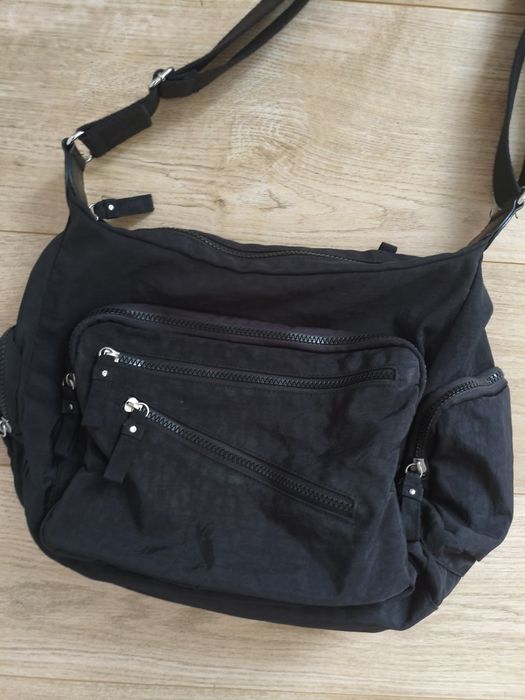 Geanta Tchibo cu multe buzunare