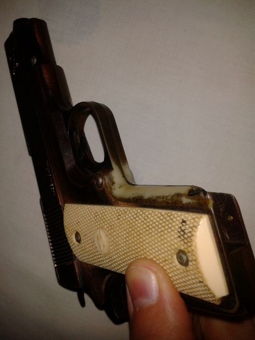 pistol jucarie vintage imitatie Colt cu amortizor incarcator in cutie