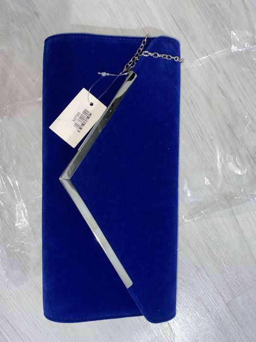 Продам новый клатч с этикеткой