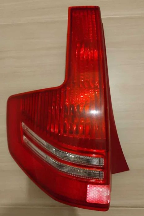 Far partea dreapta + Stop / lampa partea stanga Citroen C4 I 2004-2010