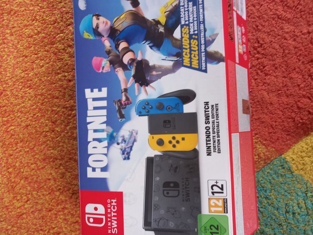 Consola Nintendo Switch v2 în stare bună.