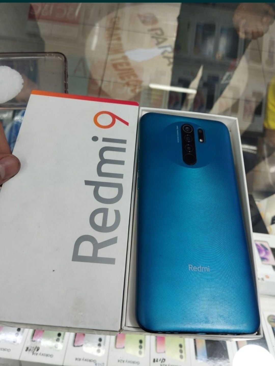 Redmi 9 4/64  xolati zor.