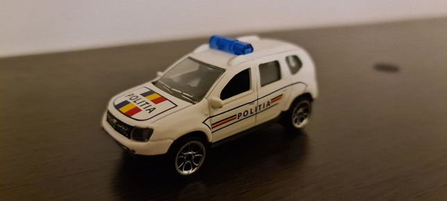 Macheta Dacia Duster 4x4 Facelift/ Politia Romana / SCARA SCALE 1/64