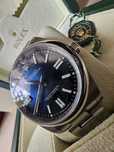 Rolex datejust 124300 blue dial