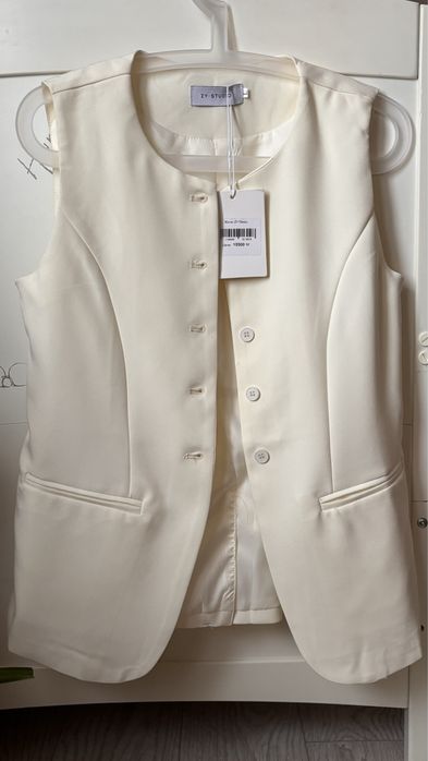 Новый жилет молочного цвета 42-44