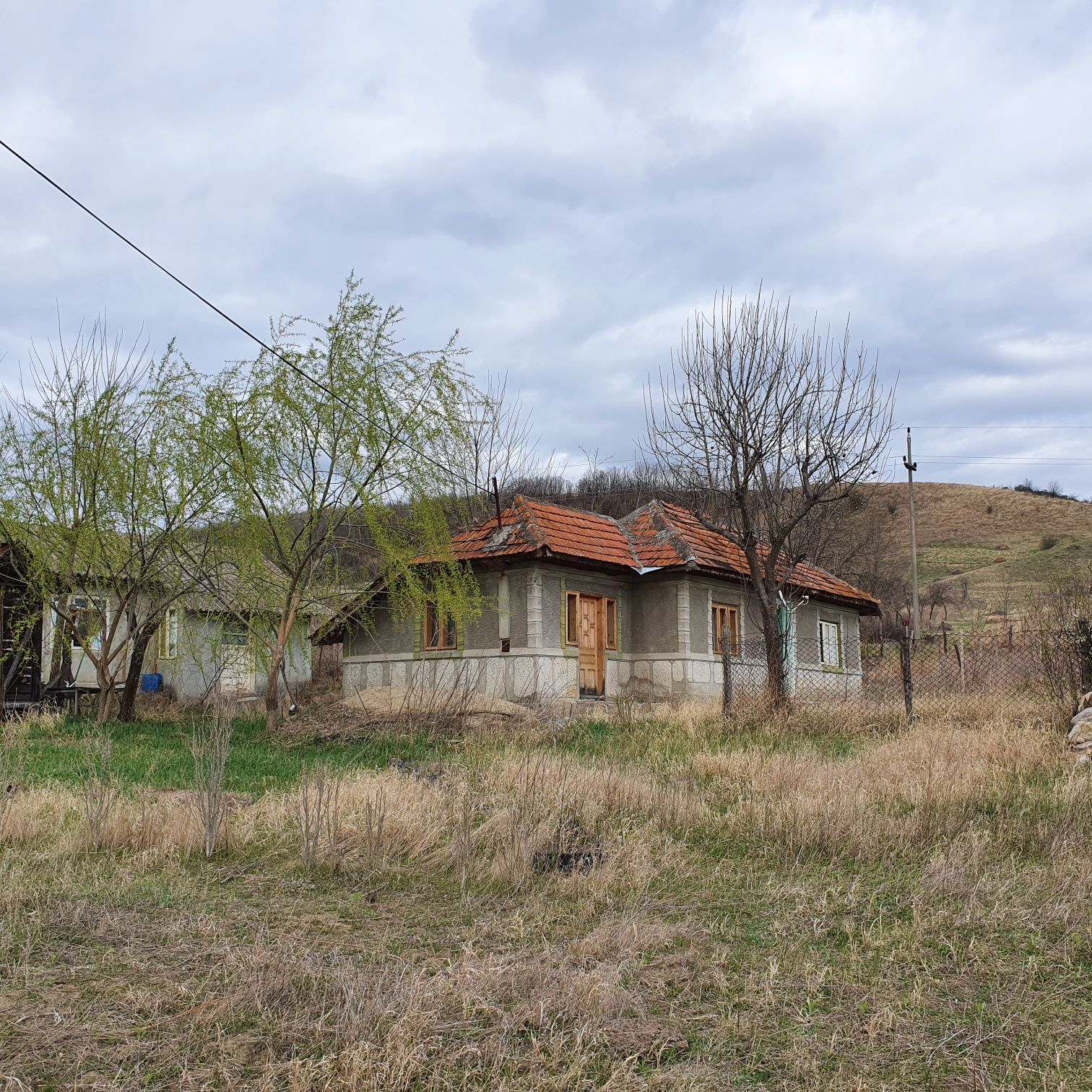 Teren intravilan și casa