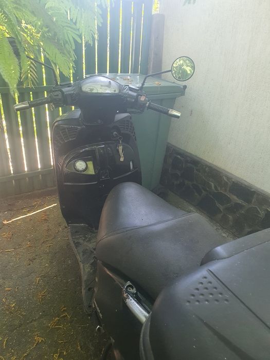 Vindem kimco People 250 urgent foarte bun înscris pe numele meu