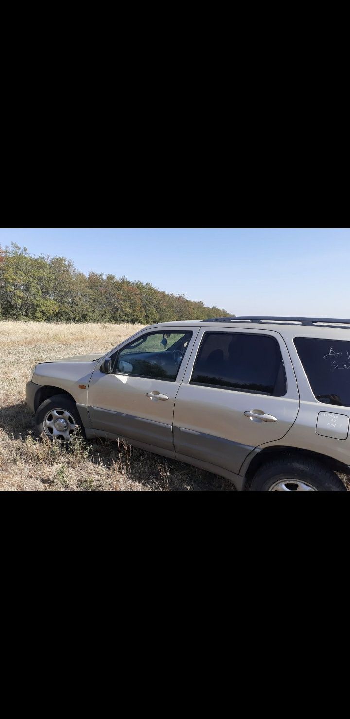 Dezmembrez Mazda Tribute 2.0si 2 3