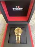златен часовник Tissot