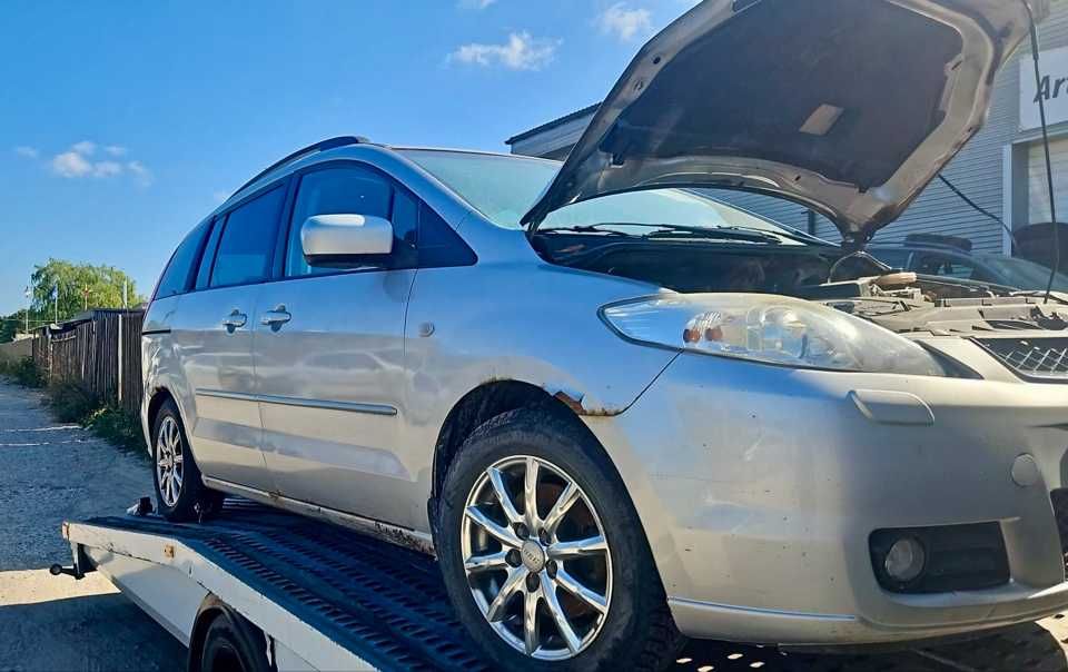 двигатель 1.8см Мазда 5 в полном навесе  привозной в наличии